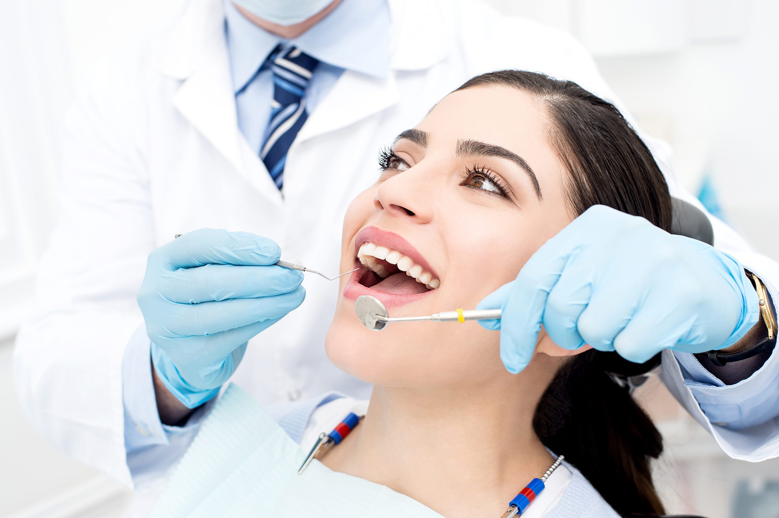 Young female patient receiving dental care